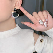 Black Heart Earrings in Gold