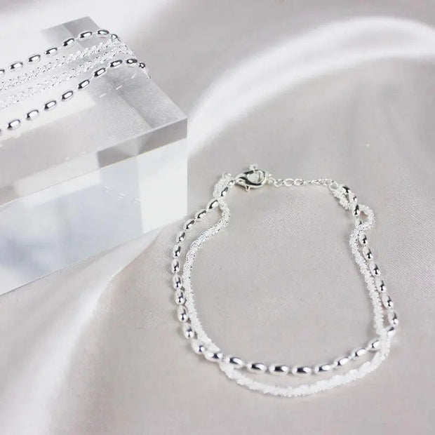 Elegant Silver Bracelet Set with Zirconia Stones