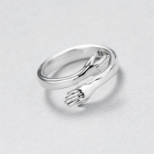 Silver adjustable hug ring