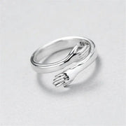 Silver adjustable hug ring