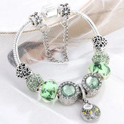 Elegant Sterling Silver Bracelet Featuring Green Crystal