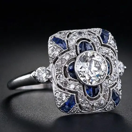 Elegant Silver Ring with Dazzling Blue Gem